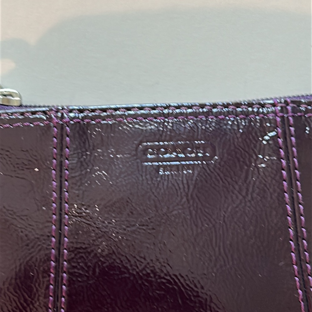 EUC Coach patent leather wristlet in dark purple or plum color and silver metal - Picture 4 of 10